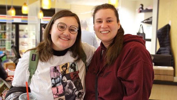 Mother and daughter pose for a photo in the Black Hawk Bookstore.